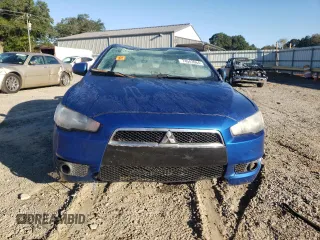 2009 Mitsubishi Lancer ES with VIN JA3AU26UX9U022011, listed as a Copart auction lot 74943964 with 129,312 mi miles and Salvage Title. Bid and sale history available at DreamBid. Image 5.