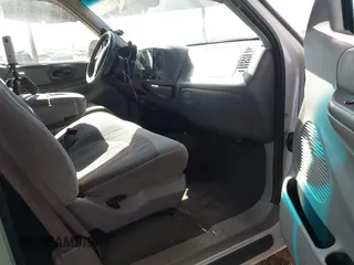 1999 Ford F-150 XL with VIN 2FTRX18L9XCA21004, listed as a IAAI auction lot 41616300 with 186,620 mi miles. Bid and sale history available at carsss.com. Image 5.