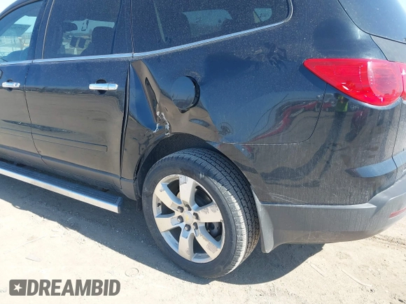2011 Chevrolet Traverse 1LT z VIN 1GNKRGEDXBJ413826, wystawiony jako IAAI lot #41774666 z przebiegiem 190 483 mil mil oraz . Historia ofert i sprzedaży dostępna na DreamBid. Obrazek 6.