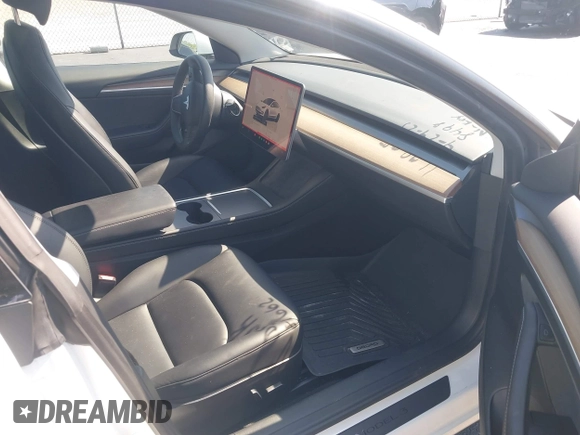 2023 Tesla Model 3 with VIN 5YJ3E1EA0PF548498, listed as a IAAI auction lot 42334326 with 17,674 mi miles and . Bid and sale history available at DreamBid. Image 5.