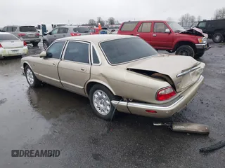 2002 Jaguar XJ 8 with VIN SAJDA14C62LF43688, listed as a IAAI auction lot 41538366 with Not provided miles and . Bid and sale history available at DreamBid. Image 3.