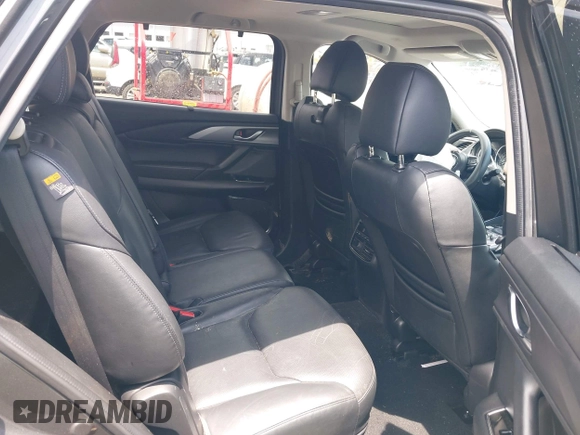 2019 Mazda CX-9 Touring with VIN JM3TCACY6K0334085, listed as a IAAI auction lot 42391595 with 113,723 mi miles and . Bid and sale history available at DreamBid. Image 8.