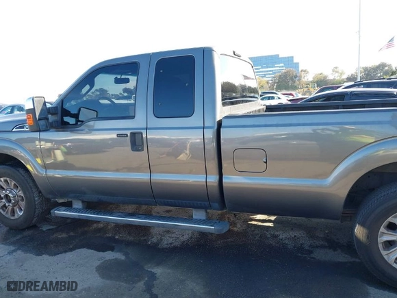 2011 Ford Super Duty F-250 SRW XL with VIN 1FT7X2A65BEA25829, listed as a IAAI auction lot 41633670 with 214,688 mi miles. Bid and sale history available at carsss.com. Image 14.