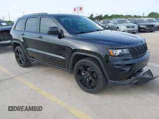 2018 Jeep Grand Cherokee Altitude with VIN 1C4RJFAG9JC436848, listed as a IAAI auction lot 42303459 with 124,044 mi miles and . Bid and sale history available at DreamBid. Image 1.