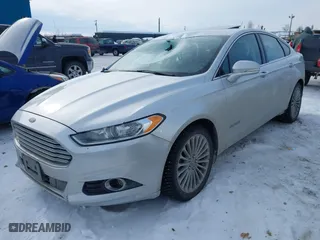 2014 Ford Fusion Titanium Hybrid with VIN 3FA6P0RU1ER291455, listed as a IAAI auction lot 41821152 with 108,408 mi miles. Bid and sale history available at carsss.com. Image 2.