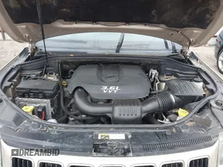 2014 Jeep Grand Cherokee Laredo with VIN 1C4RJEAG5EC424244, listed as a IAAI auction lot 41608821 with 156,251 mi miles and . Bid and sale history available at DreamBid. Image 6.