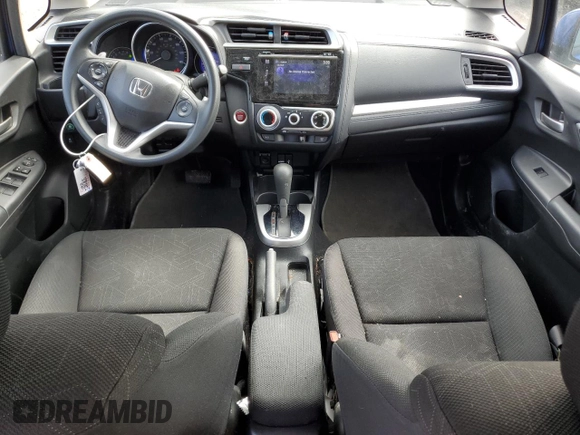 2016 Honda Fit EX with VIN JHMGK5H73GS012857, listed as a Copart auction lot 50886755 with 56,500 mi miles and Clean title. Bid and sale history available at DreamBid. Image 8.