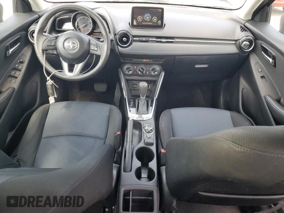 2016 Scion iA with VIN 3MYDLBZV6GY143071, listed as a Copart auction lot 69697704 with 97,689 mi miles and Salvage Title. Bid and sale history available at carsss.com. Image 8.
