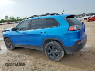 2021 Jeep Cherokee Altitude with VIN 1C4PJLLB0MD215189, listed as a Copart auction lot 61094535 with 88,449 mi miles and Salvage title. Bid and sale history available at DreamBid. Image 2.