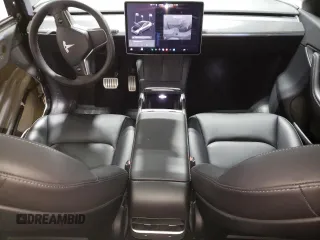 2021 Tesla Model Y Performance with VIN 5YJYGDEF2MF134700, listed as a Copart auction lot 56325685 with 66,730 mi miles and Salvage Title. Bid and sale history available at DreamBid. Image 8.
