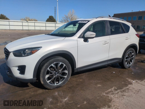 2016 Mazda CX-5 Grand Touring with VIN JM3KE4DY8G0671256, listed as a Copart auction lot 52920975 with 87,822 mi miles and Non Repairable. Bid and sale history available at carsss.com. Image 1.