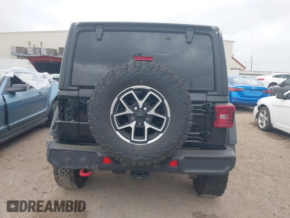 2024 Jeep Wrangler Rubicon with VIN 1C4PJXFG6RW337596, listed as a IAAI auction lot 41958788 with 15,942 mi miles and . Bid and sale history available at DreamBid. Image 17.