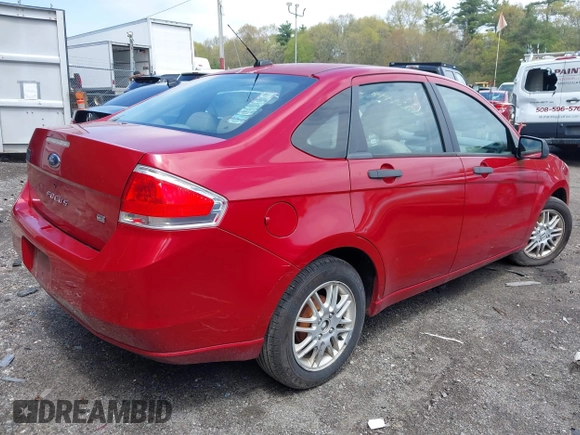 2009 Ford Focus SE with VIN 1FAHP35N89W243205, listed as a IAAI auction lot 42149989 with 148,058 mi miles. Bid and sale history available at carsss.com. Image 4.