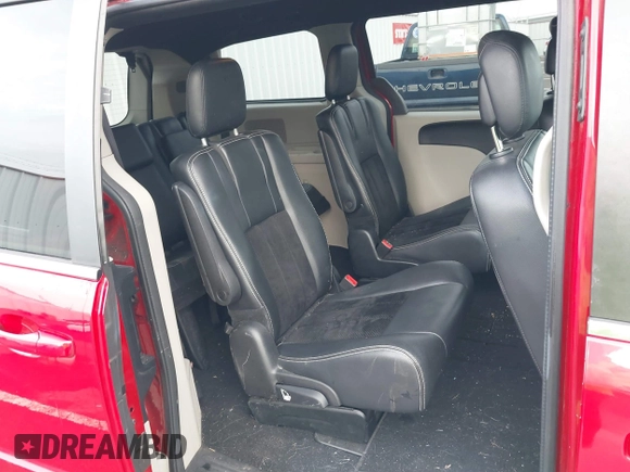 2014 Dodge Grand Caravan SXT with VIN 2C4RDGCG3ER257695, listed as a IAAI auction lot 41534568 with 116,896 mi miles and . Bid and sale history available at DreamBid. Image 8.
