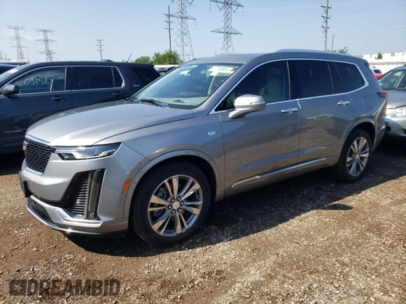 2024 Cadillac XT6 FWD Premium Luxury with VIN 1GYKPCRS7RZ736818, listed as a Copart auction lot 67768804 with 7,145 mi miles and Salvage Title. Bid and sale history available at carsss.com. Image 1.