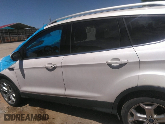 2017 Ford Escape Titanium with VIN 1FMCU0JD8HUE52149, listed as a IAAI auction lot 41974274 with 143,707 mi miles and . Bid and sale history available at DreamBid. Image 14.
