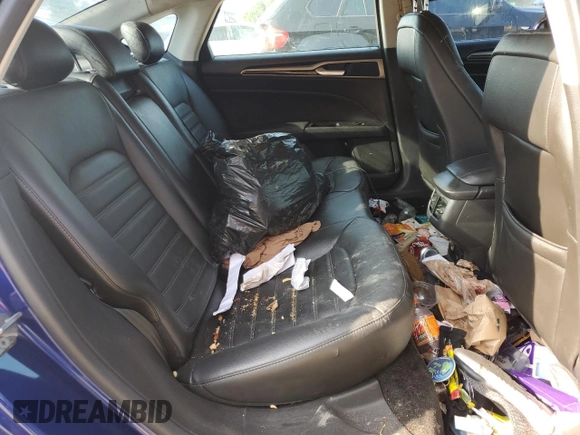 2013 Ford Fusion SE Hybrid z VIN 3FA6P0LU8DR295297, wystawiony jako Copart lot #61830065 z przebiegiem 190 096 mil mil oraz Czysty tytuł • Clean title. Historia ofert i sprzedaży dostępna na DreamBid. Obrazek 10.
