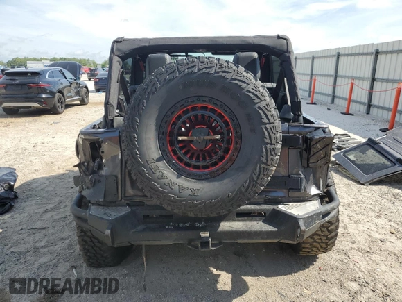 2016 Jeep Wrangler Unlimited Rubicon with VIN 1C4BJWFG8GL192077, listed as a Copart auction lot 58339005 with 62,076 mi miles and Salvage title. Bid and sale history available at DreamBid. Image 6.