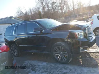 2019 GMC Yukon Denali with VIN 1GKS2CKJ2KR137664, listed as a IAAI auction lot 41335229 with 151,394 mi miles and . Bid and sale history available at DreamBid. Image 14.