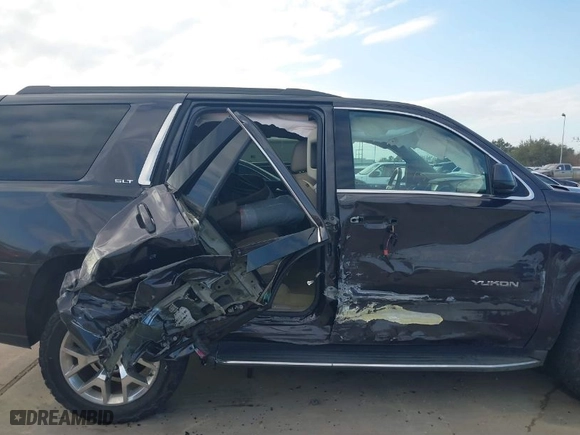 2016 GMC Yukon SLT with VIN 1GKS2BKC1GR406739, listed as a IAAI auction lot 41247286 with 106,023 mi miles. Bid and sale history available at carsss.com. Image 6.