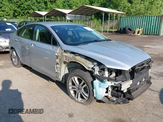 2016 Ford Fusion SE Hybrid with VIN 3FA6P0LU6GR121605, listed as a IAAI auction lot 42651096 with 194,693 mi miles and . Bid and sale history available at DreamBid. Image 1.