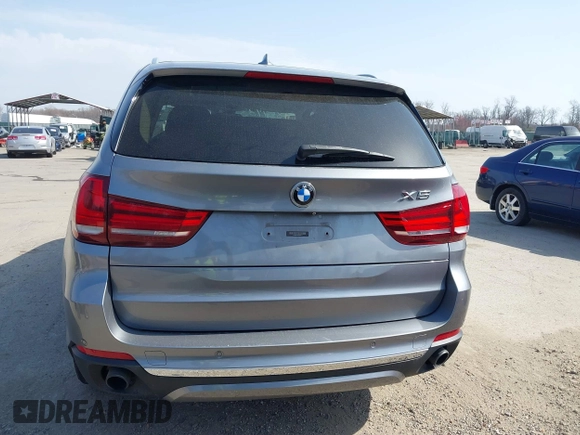 2015 BMW X5 xDrive35i with VIN 5UXKR0C53F0K60910, listed as a IAAI auction lot 41857733 with 153,583 mi miles. Bid and sale history available at carsss.com. Image 16.
