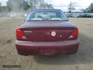 2003 Kia Spectra with VIN KNAFB121935241589, listed as a Copart auction lot 71933194 with 61,738 mi miles and Salvage Title. Bid and sale history available at carsss.com. Image 6.