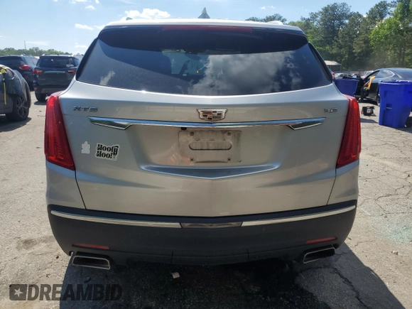 2017 Cadillac XT5 FWD с VIN 1GYKNARS9HZ107327, выставлен на аукционе Copart как лот 56099575 с пробегом 111 718 миль миль и Списание • Salvage title. История ставок и продаж доступна на DreamBid. Изображение 6.