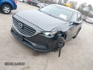2016 Mazda CX-9 Touring with VIN JM3TCBCY7G0107632, listed as a IAAI auction lot 41721218 with 95,326 mi miles. Bid and sale history available at carsss.com. Image 17.