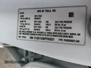 2023 Tesla Model 3 with VIN 5YJ3E1EA6PF563331, listed as a Copart auction lot 61124715 with 26,198 mi miles and Salvage title. Bid and sale history available at DreamBid. Image 12.