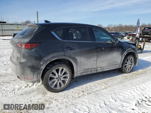 2021 Mazda CX-5 Grand Touring with VIN JM3KFBDM5M1456650, listed as a Copart auction lot 42124045 with 45,205 mi miles and Salvage Title. Bid and sale history available at carsss.com. Image 3.