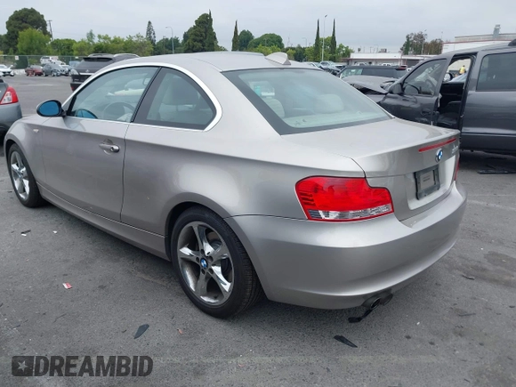 2009 BMW 1 Series 128i with VIN WBAUP93599VF48622, listed as a IAAI auction lot 42360145 with 64,913 mi miles and . Bid and sale history available at DreamBid. Image 3.