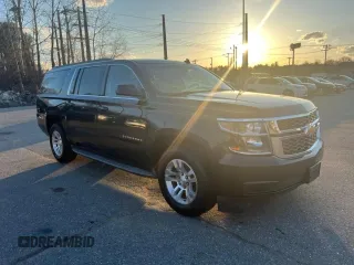 2015 Chevrolet Suburban with VIN 1GNSKHEC4FR25217, listed as a Copart auction lot 65346775 with 213,363 mi miles and Clean title. Bid and sale history available at DreamBid. Image 1.