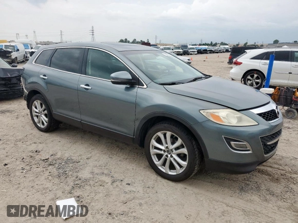 2011 Mazda CX-9 Grand Touring with VIN JM3TB2DA2B0317438, listed as a Copart auction lot 59502395 with 181,506 mi miles and Salvage title. Bid and sale history available at DreamBid. Image 4.