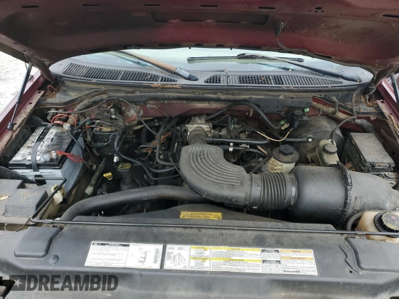 1999 Ford F-150 XL z VIN 1FTRX18L1XNB22080, wystawiony jako Copart lot #42920695 z przebiegiem 253 223 mil mil oraz Czysty tytuł • Clean title. Historia ofert i sprzedaży dostępna na DreamBid. Obrazek 11.