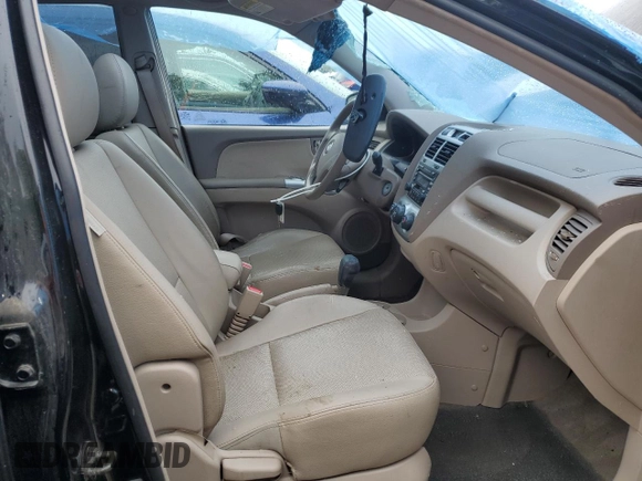2006 Kia Sportage LX with VIN KNDJE723567251425, listed as a Copart auction lot 59339225 with 156,958 mi miles and Non repairable. Bid and sale history available at DreamBid. Image 7.