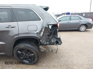 2016 Jeep Grand Cherokee High Altitude with VIN 1C4RJFCG7GC316309, listed as a IAAI auction lot 41557459 with 144,700 mi miles. Bid and sale history available at carsss.com. Image 6.