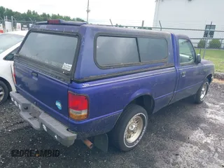 1995 Ford Ranger Splash z VIN 1FTCR10AXSUA06403, wystawiony jako IAAI lot #42532150 z przebiegiem 82 445 mil mil oraz . Historia ofert i sprzedaży dostępna na DreamBid. Obrazek 4.