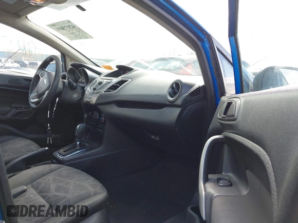 2011 Ford Fiesta SE with VIN 3FADP4EJ0BM173576, listed as a IAAI auction lot 42075691 with 128,835 mi miles. Bid and sale history available at carsss.com. Image 5.