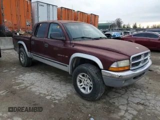 2001 Dodge Dakota Sport with VIN 1B7HG2AN11S320731, listed as a Copart auction lot 86474754 with 164,632 mi miles and Salvage Title. Bid and sale history available at carsss.com. Image 4.