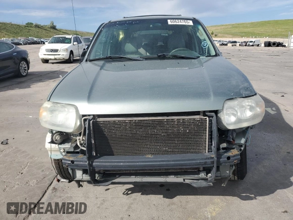 2005 Ford Escape Hybrid z VIN 1FMCU95HX5KE24619, wystawiony jako Copart lot #60624765 z przebiegiem 209 937 mil mil oraz Nie do naprawy • Non repairable. Historia ofert i sprzedaży dostępna na DreamBid. Obrazek 5.