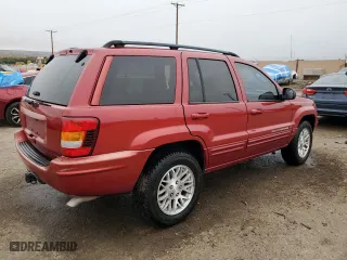 2003 Jeep Grand Cherokee Limited with VIN 1J4GW58N63C598392, listed as a Copart auction lot 79246834 with 163,072 mi miles and Salvage Title. Bid and sale history available at carsss.com. Image 3.