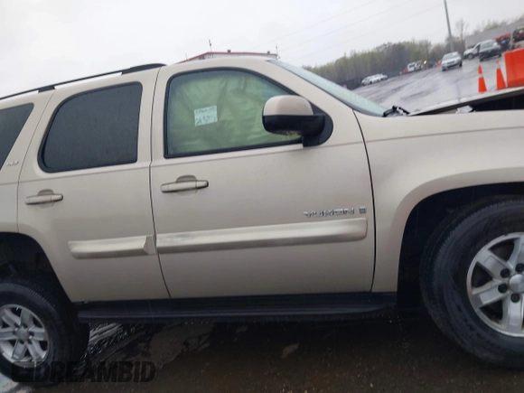 2007 GMC Yukon SLT z VIN 1GKFK13037J282696, wystawiony jako IAAI lot #41996538 z przebiegiem 143 607 mil mil oraz . Historia ofert i sprzedaży dostępna na DreamBid. Obrazek 13.