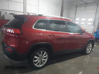 2015 Jeep Cherokee Limited with VIN 1C4PJLDS0FW585595, listed as a IAAI auction lot 41371621 with 102,108 mi miles and . Bid and sale history available at DreamBid. Image 13.
