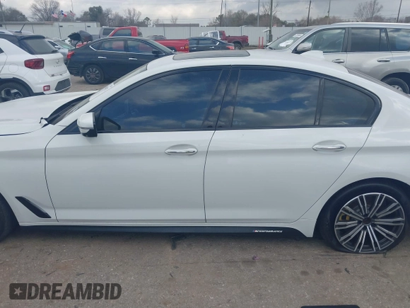 2017 BMW 5 Series 540i with VIN WBAJE5C3XHG913955, listed as a IAAI auction lot 41499473 with 107,227 mi miles and . Bid and sale history available at carsss.com. Image 14.