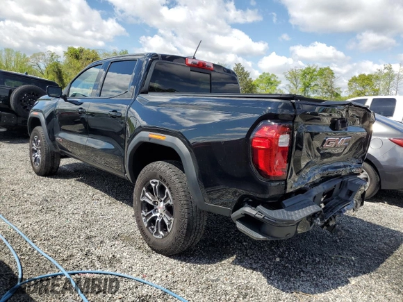 2023 GMC Canyon 4WD AT4 with VIN 1GTP6DEK9P1151776, listed as a Copart auction lot 52977805 with 11,750 mi miles and Salvage Title. Bid and sale history available at carsss.com. Image 2.