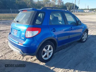 2007 Suzuki SX4 z VIN JS2YB413375107446, wystawiony jako IAAI lot #40961240 z przebiegiem 147 739 mil mil oraz . Historia ofert i sprzedaży dostępna na DreamBid. Obrazek 4.