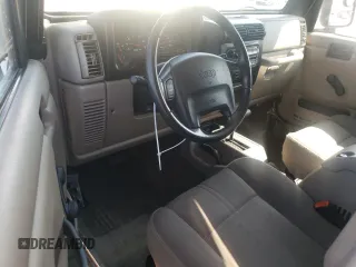 2003 Jeep Wrangler Sahara with VIN 1J4FA59S23P303845, listed as a Copart auction lot 68101244 with 141,753 mi miles and Clean Title. Bid and sale history available at carsss.com. Image 8.