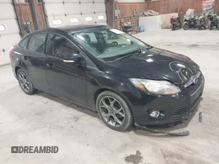 2014 Ford Focus SE with VIN 1FADP3F20EL114485, listed as a IAAI auction lot 41988373 with 119,963 mi miles. Bid and sale history available at carsss.com. Image 1.