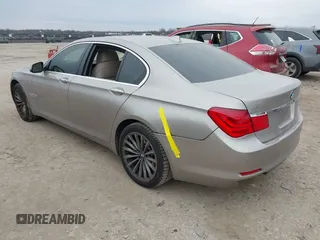 2012 BMW 7 Series 740i with VIN WBAKA4C51CC613670, listed as a IAAI auction lot 41582639 with 149,753 mi miles. Bid and sale history available at carsss.com. Image 3.